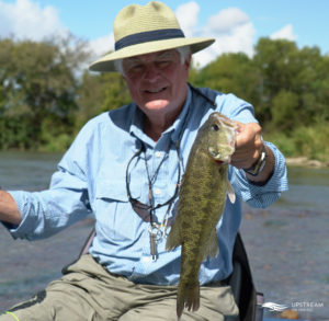 Upstream On The Fly Customer with a Bass caught in North Texas while Fly Fishing